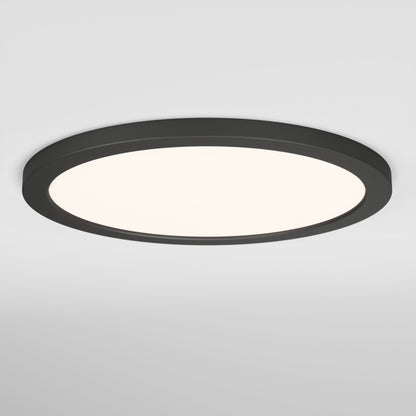 The Skylight Pro 15" 5K LED Flat Panel Light features an ultra-slim black frame with a white illuminated center, creating a sleek modern look when mounted on a plain white ceiling.