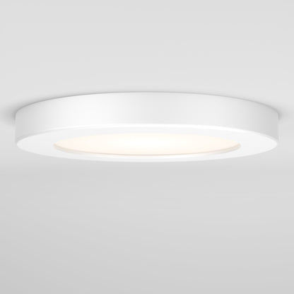 The 5FLPR-SP3-W is a modern, round, white ceiling light fixture with a smooth surface that emits a soft, diffused glow onto a white ceiling.